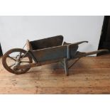 A RUSTIC FRENCH 19th CENTURY BLUE PAINTED WHEEL BARROW, with removable side panels, 59 x 67 x 190cms