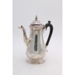 A HALLMARK SILVER COFFEE POT, George Howson, Sheffield 1904, 22cm high, 16 oz in total