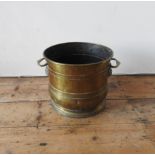 19th CENTURY BRASS TW0-HANDLED COAL SCUTTLE WITH LION DECORATION, 28cm high, 33cm dia