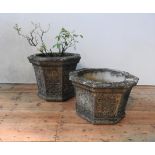 TWO WEATHERED RECONSTITUTED STONE OCTAGONAL GARDEN PLANTERS