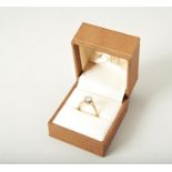 AN 18CT GOLD SOLITAIRE DIAMOND RING