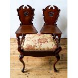 A PAIR OF VICTORIAN MAHOGANY HALL CHAIRS AND A PIANO STOOL, the chairs measuring 88 x 44cms