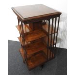A 19th CENTURY MAHOGANY 3-TIER REVOLVING BOOKCASE, on brass casters, 119cm high, 60cm square