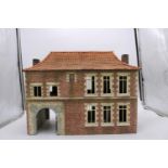 A MODEL OF FLEMISH FARM HOUSE, robust ply construction with moulded detail, 36cm high x 45cm wide