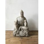 A CARVED WHITE MARBLE DECORATIVE STATUE OF GUAN YIN, 64cm high