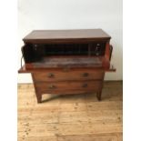 AN EARLY 19th CENTURY MAHOGANY 4-DRAWER SECRETAIRE CHEST ON SPLAYED BRACKET FEET, the top drawer