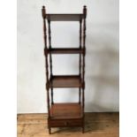 AN EARLY VICTORIAN ROSEWOOD 4-TIER WHAT NOT, with single drawer to base, turned pillar supports with