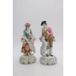 A PAIR OF 18th CENTURY CHELSEA PORCELAIN FIGURES OF SHEPHERD AND SHEPHERDESS, with gold anchor