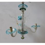 A MURANO GLASS CHANDELIER WITH BLUE TINGE