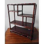 SET OF CHINESE SIMULATED BAMBOO HARDWOOD STANDING SHELVES 20TH CENTURY 58cm high, 45cm wide