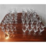 A MIXED SUITE OF FLUTED STEMMED DRINKING GLASSES, some etched with Waterford mark (52)