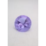 A ROSENTHAL AMETHYST COLOURED GLASS 'PRINCESS CUT' PAPER WEIGHT, the Rosenthal mark etched onto base