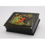 A USSR 20th CENTURY HAND PAINTED PAPIER MACHE LAQUERED TRINKET BOX, decorated with folk lore