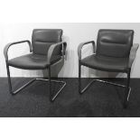 A PAIR OF TUBULAR CHROME FRAMED CANTILEVER CHAIRS, with grey leatherette upholstery, 81 x 62 x 48cms