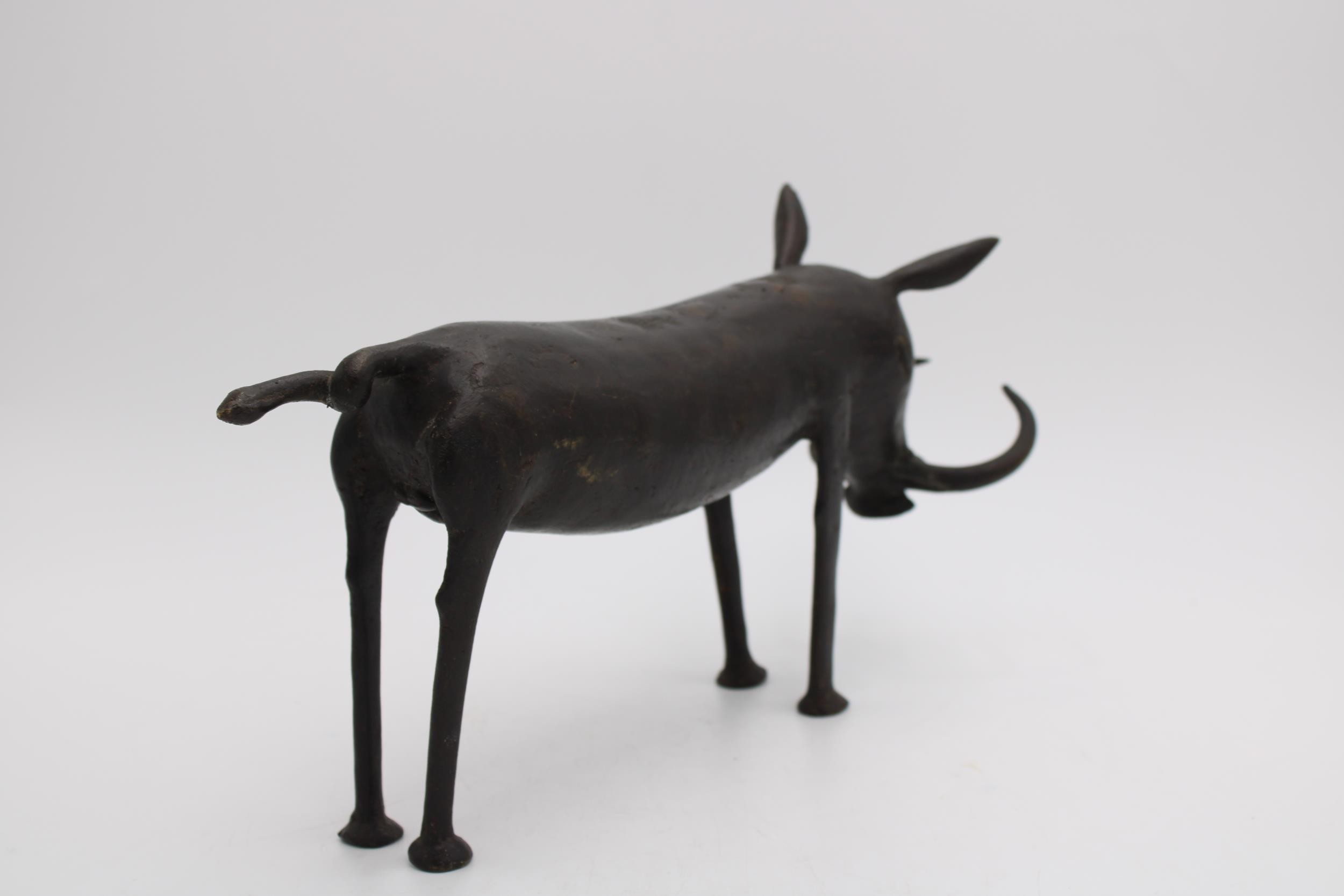 A NAIVE BRONZE SCULPTURE OF WILD BOAR, 19cm high x 39cm long - Image 2 of 2