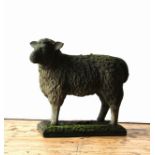 A CAST WEATHERED RECONSTITUTED STONE GARDEN FIGURE OF SHEEP ON RECTANGULAR PLINTH, 66cm high x