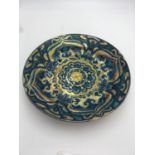 L. E. F. BODART ENAMELLED DELFT CERAMIC CHARGER decorated in tones of turquoise and blue with