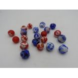 GROUP OF TWENTY ONE CHINESE RED AND BLUE OVERLAY GLASS BEADS 20TH CENTURY (21)