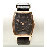 SWISS TONNEAU 9CT MANUAL WIND WRISTWATCH, c1930, with marked STOLKACE case by George Stoll, the