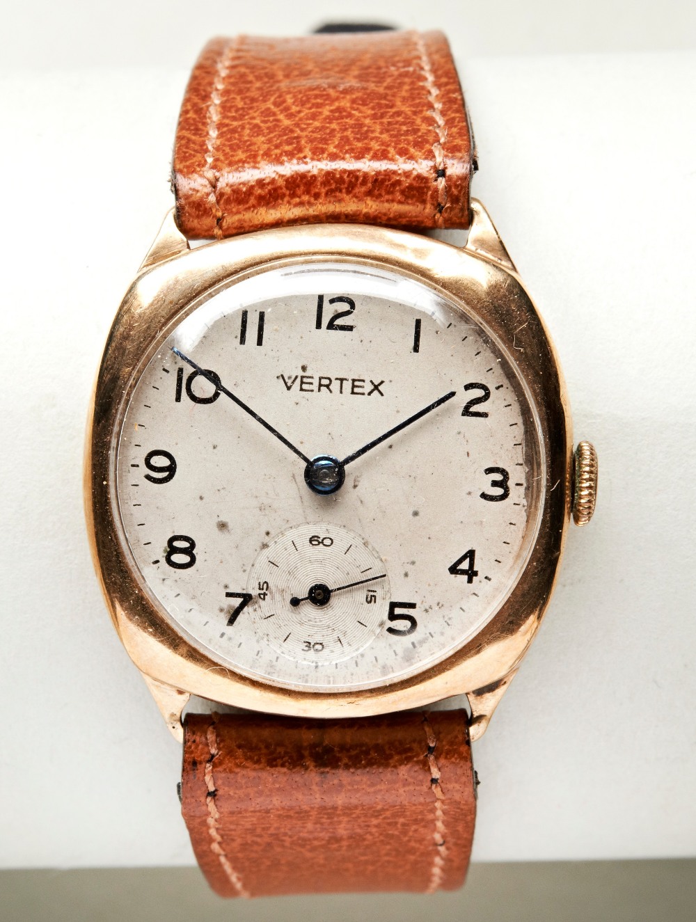 VERTEX 9CT GOLD MANS WRISTWATCH, c1940s, with later brown leather strap. PROVENANCE: The