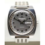 JAEGER-LECOULTRE STAINLESS STEEL CLUB DAY/DATE LATE 1960S AUTOMATIC WRISTWATCH, with broad baton