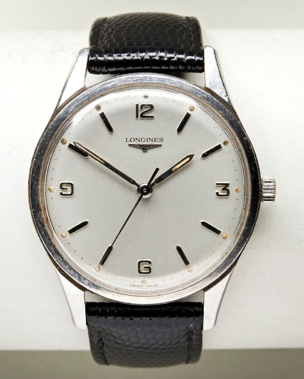 LONGINES STEEL WRISTWATCH, c1960, silver dial with Arabic and baton numerals and later lizard/calf