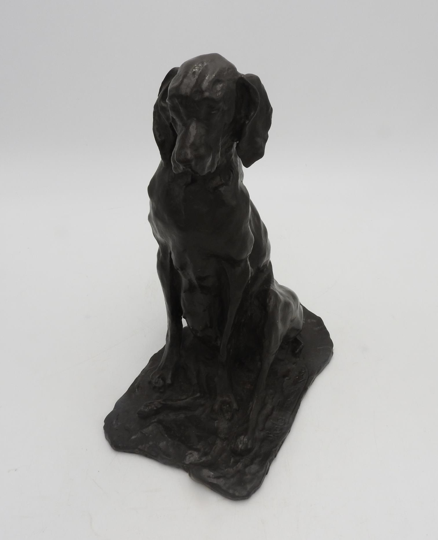 A BRONZE FIGURE OF SEATED DOG SIGNED AND DATED PAOLO TROUBETZKOY 1893, dark brown patina, 25 cm high