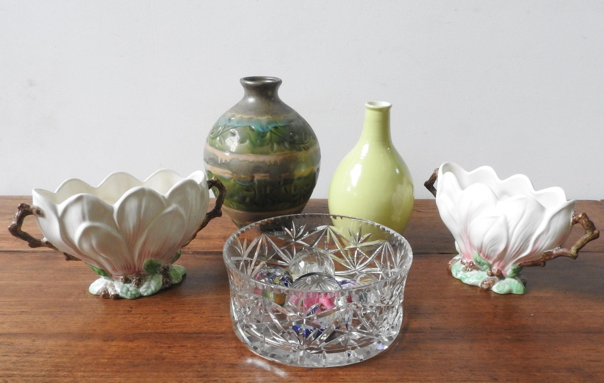 A PAIR OF SYLVAC LOTUS FLOWER BOWLS, POOLE POTTERY VASE, CUT GLASS BOWL AND PAPER WEIGHTS, and a