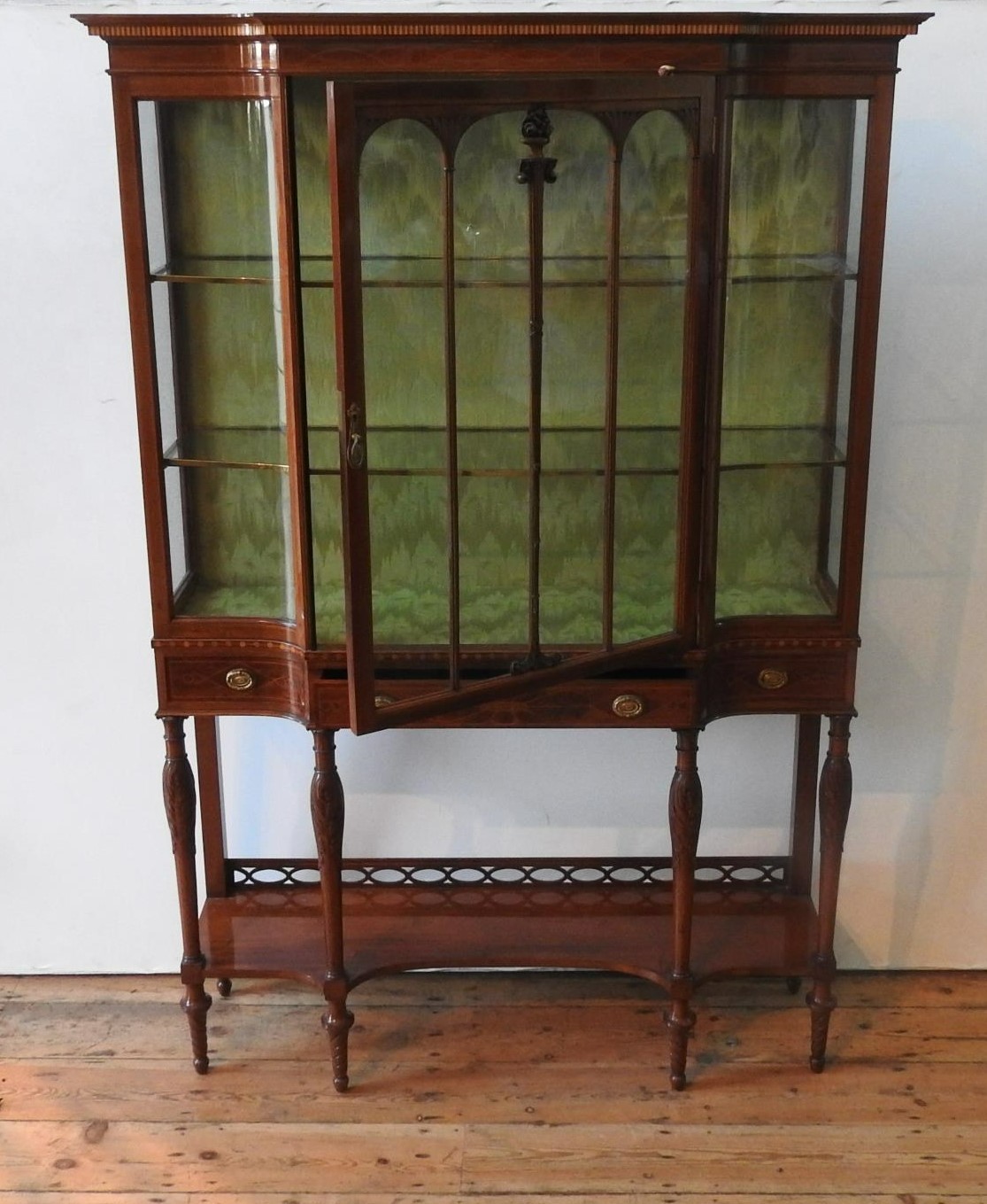 AN EDWARDIAN MAHOGANY INLAID GLAZED BREAK-FRONT DISPLAY CABINET, with bowed glass panels, a long - Image 2 of 2