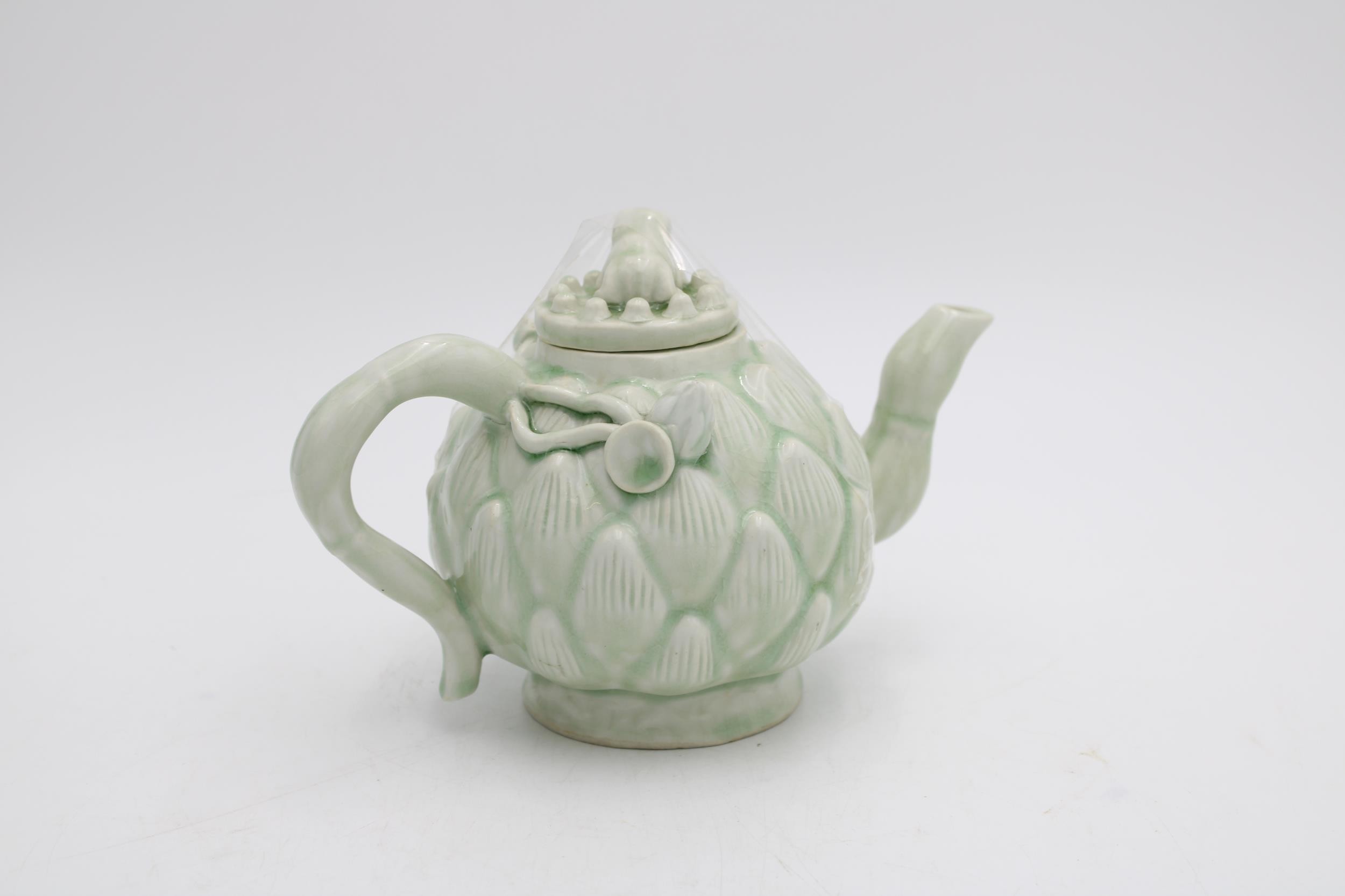 A CELADON GLAZE LOTUS TEAPOT WITH FROG AND NEWT DECORATION, 14cm high - Image 2 of 2