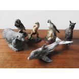 A MARBLE DOLPHIN FIGURE, SOAPSTONE BEAR AND THREE RESIN BIRD ORNAMENTS, and a resin Llama figure,