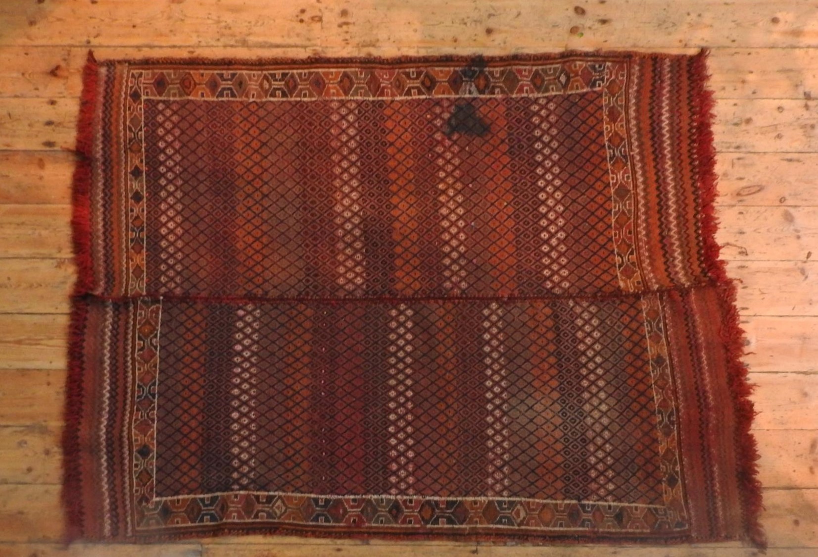 A BORDER PATTERN EASTERN RUG