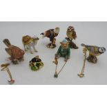 A COLLECTION OF SEVEN ENAMELLED METAL TRINKET BOXES, in the form of animals and teddy bear, the