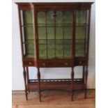 AN EDWARDIAN MAHOGANY INLAID GLAZED BREAK-FRONT DISPLAY CABINET, with bowed glass panels, a long