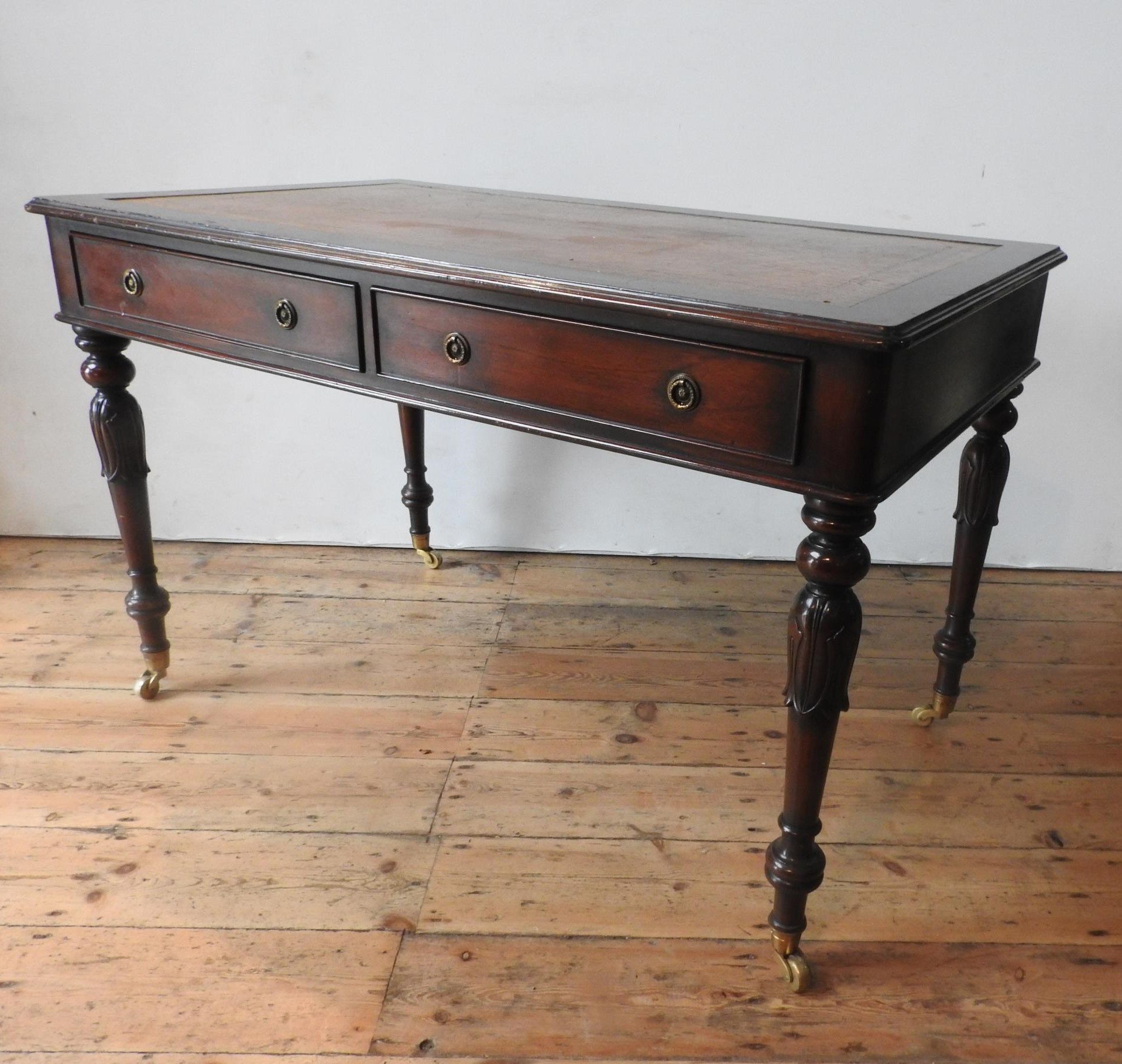 A 20TH CENTURY MAHOGANY REGENCY STYLE LIBRARY TABLE, with leather top, the legs carved with tulip - Image 3 of 3