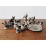 A COLLECTION OF THIRTEEN POOLE POTTERY BARBARA LINLEY ADAMS ANIMAL FIGURES AND TWO WALL PLATES,