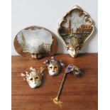 A COLLECTION OF FIVE PAINTED VENETIAN PAPIER MACHE MASQUERADE MASKS