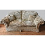 A LARGE BROCADE UPHOLSTERED THREE SEAT SOFA AND MATCHING SOFA,with scroll arms, foliate brocade