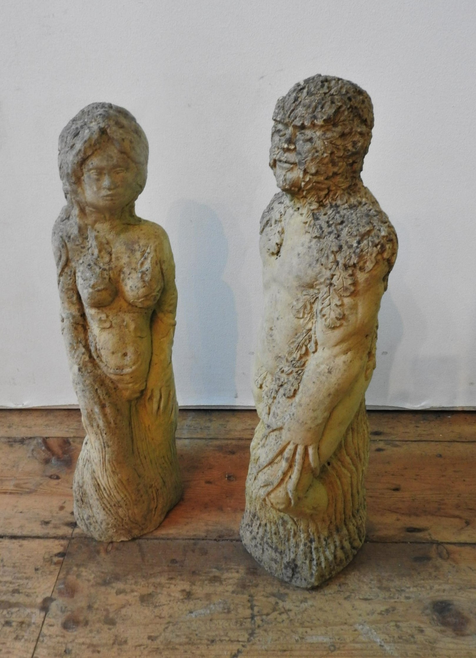 TWO WEATHERED RECONSTITUTED GARDEN 'WOODLAND' FIGURES, 38cm and similar