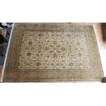 A GOOD QUALITY LARGE FLORAL PATTERN DEEP BORDER SILK CARPET, 435 x 297 cm