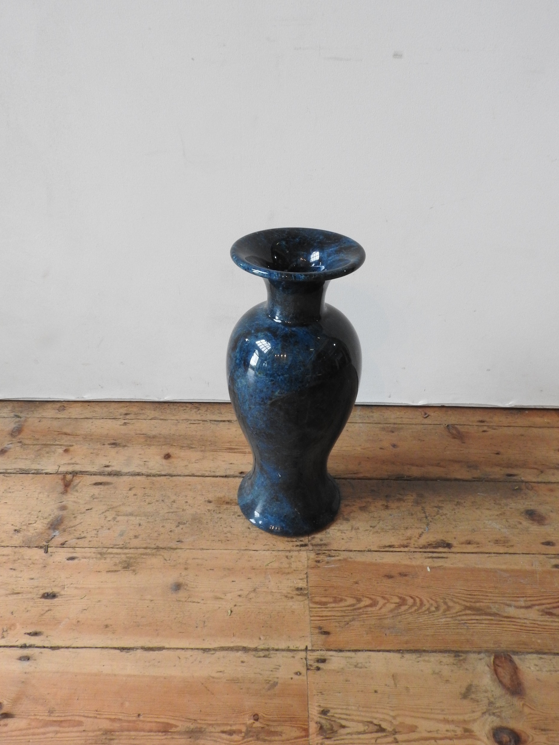 A LARGE MARBLE EFFECT BALUSTER VASE, 51cm high