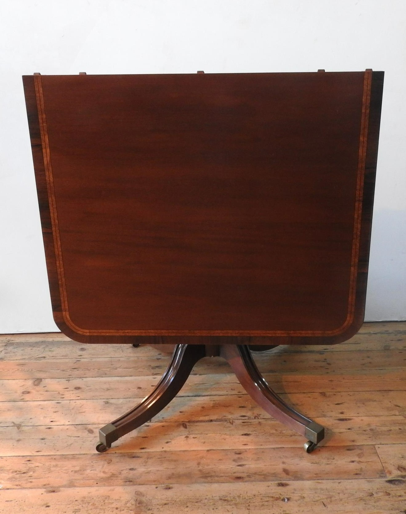 A 20TH CENTURY TWIN PEDEDSTAL D-END CROSS BANDED DINING TABLE AND 6 DINING CHAIRS, with tilting - Image 4 of 4