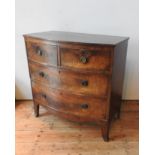 A REGENCY MAHOGANY BOW FRONT CHEST OF FOUR DRAWERS, two short drawers over two long drawers on