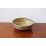 A LACQUERED BAMBOO CIRCULAR BOWL, 10cm high x 30cm dia