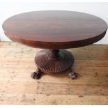 A VICTORIAN MAHOGANY CIRCULAR TILT-TOP BREAKFAST TABLE, with turned central pillar on 'sunburst'