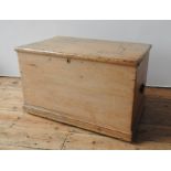 A 19TH CENTURY WAXED PINE BLANKET BOX, with two iron ring handles, 52 x 83 x 52 cm