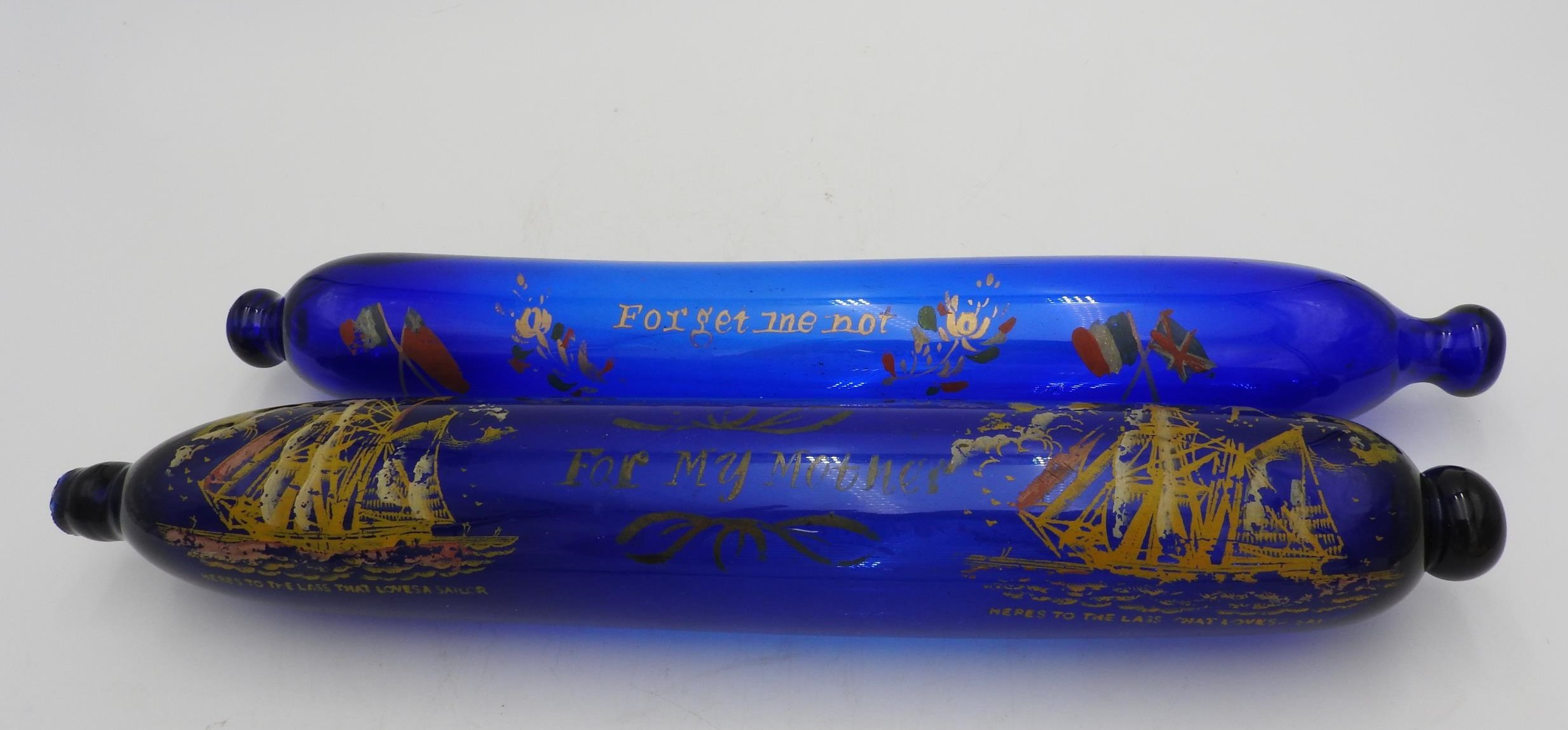 FIVE EARLY 19TH CENTURY COMMEMORATIVE BRISTOL COBALT BLUE GLASS NAVAL ROLLING PINS, 33 cm long - Image 2 of 2