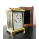 A FRENCH BRASS CARRIAGE CLOCK WITH CARRY CASE AND KEY, inscribed F.A Chandler, Paris, 15 cm high