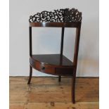A 20TH CENTURY MAHOGANY CORNER WASHSTAND, with carved fret work back panel
