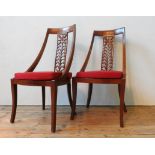 A SET OF EIGHT 20TH CENTURY ANGLO-CHINESE ROSEWOOD DINING CHAIRS, with floral carved splats, elegant